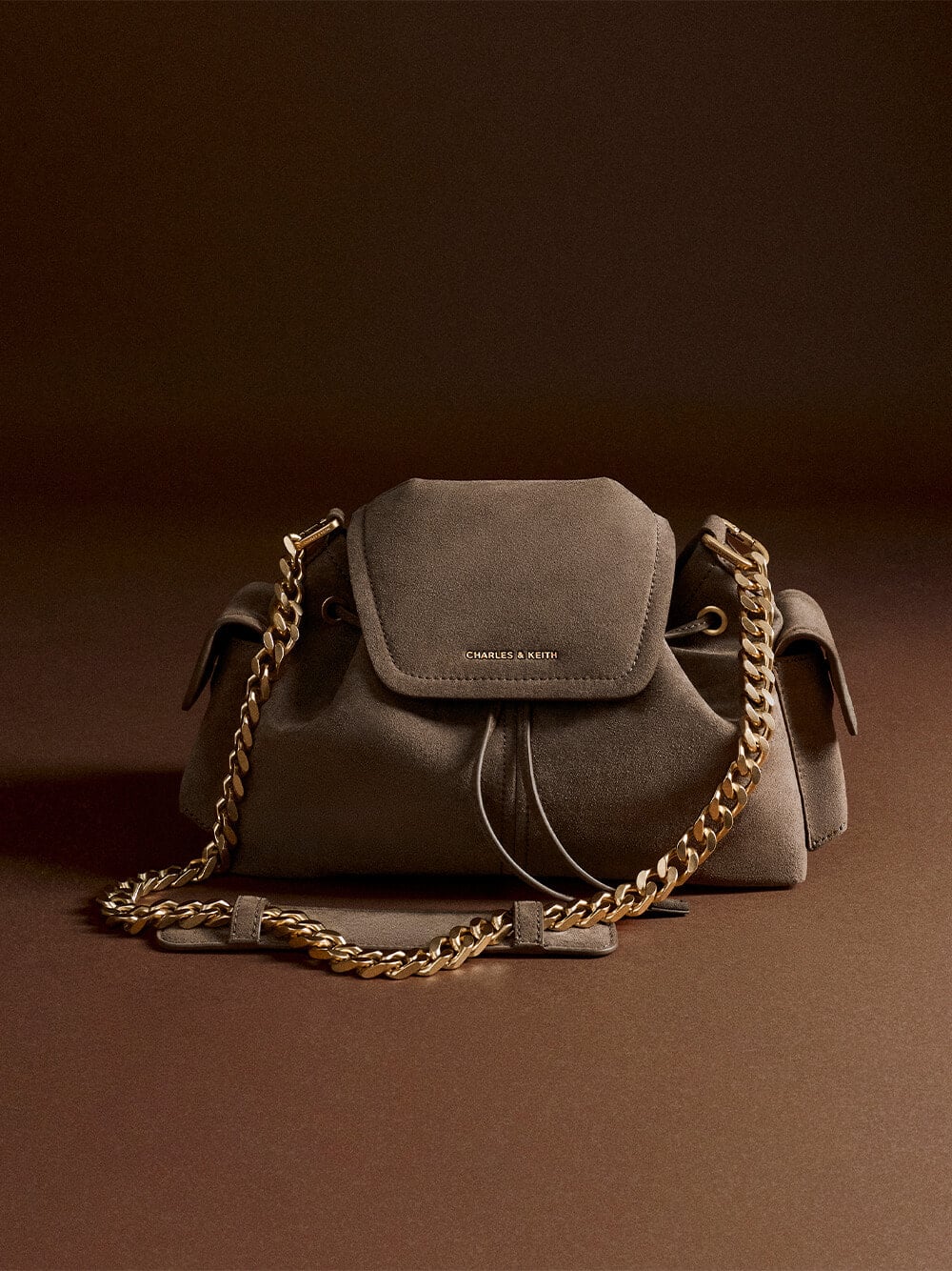 Noane Side-Pocket Bucket Bag in stone grey - CHARLES & KEITH