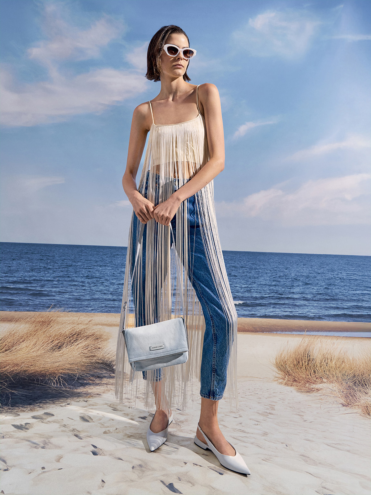 Ivette Denim Front Flap Crossbody Bag in light washed denim - CHARLES & KEITH