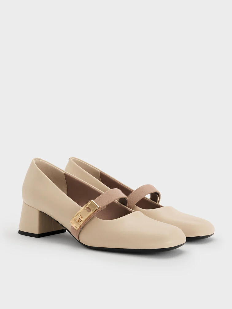 Mary Jane pumps with block heels, an elevated option for smart-casual looks.