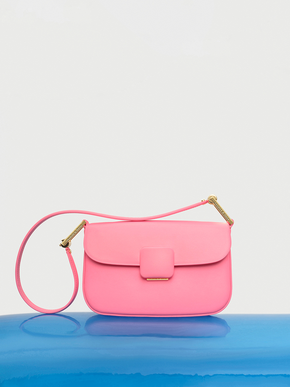Women's pink, blue woven trapeze heel buckled Sandals and pink Koa square push-lock shoulder bag - CHARLES & KEITH