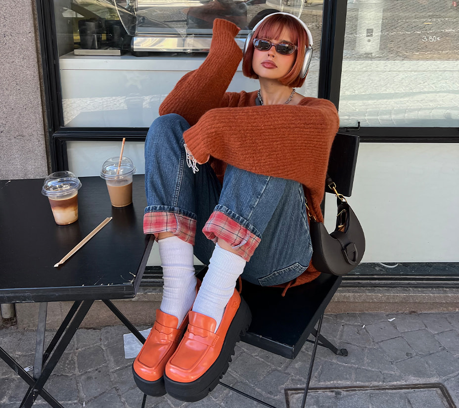 Women’s ITZY Gabine Belted Hobo Bag in dark moss; ITZY Rainier Chunky Platform Penny Loafers in orange, as seen on Ines Silva - CHARLES & KEITH