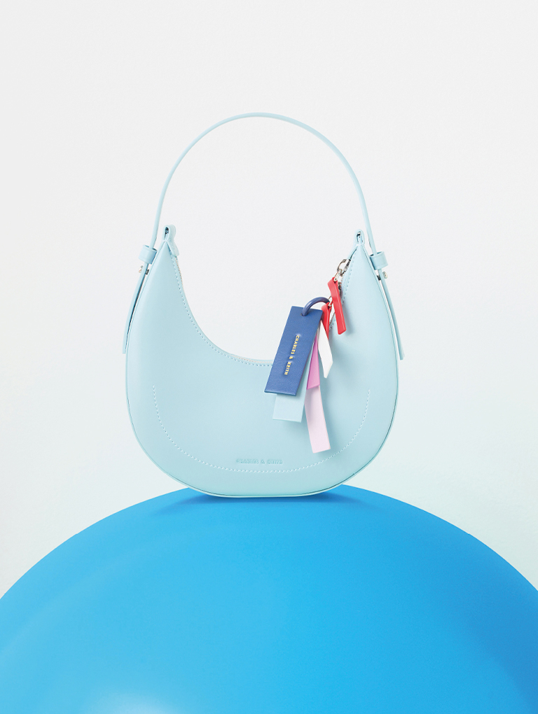 Women’s Cockade crescent hobo bag in blue - CHARLES & KEITH