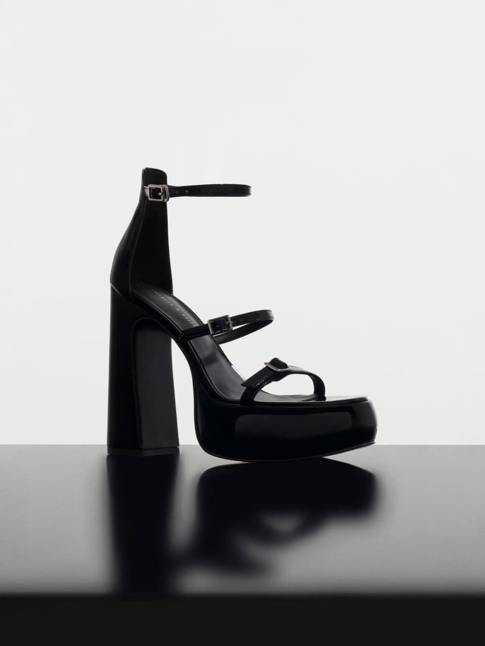 Women’s black Elvina patent buckled platform sandals - CHARLES & KEITH
