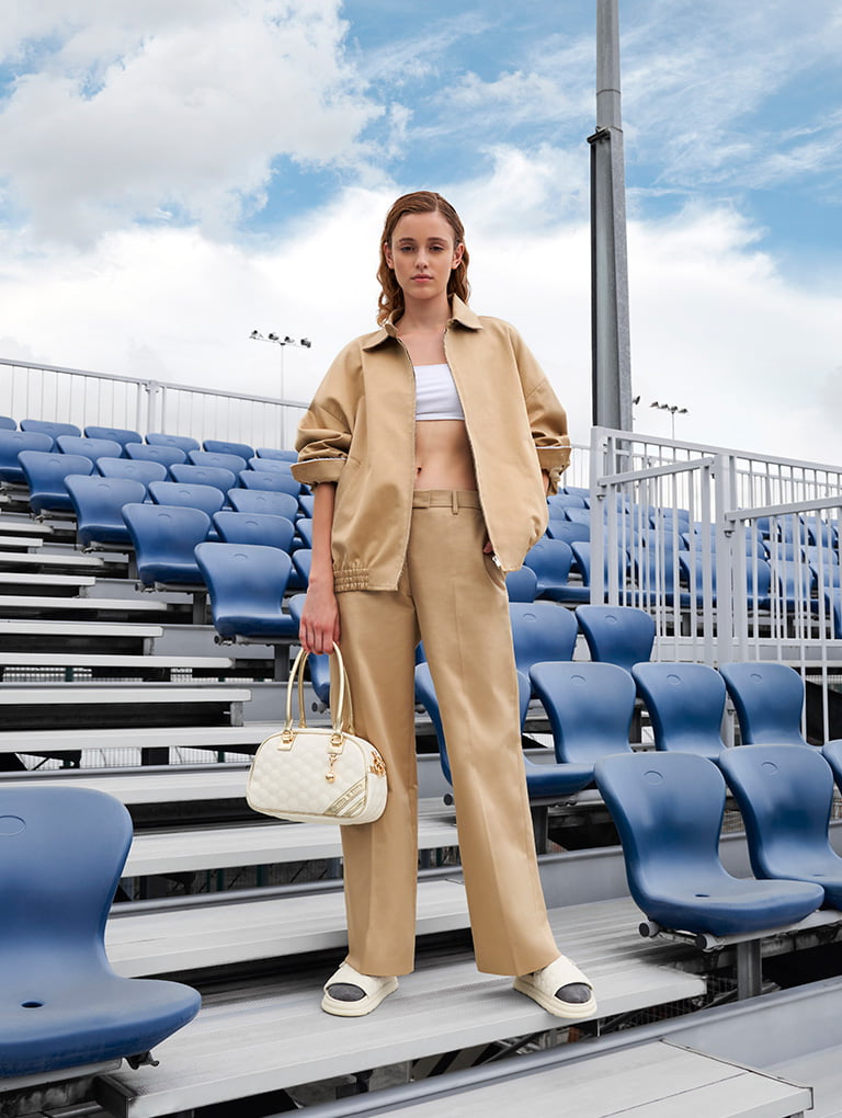 Women’s patterned flatform sliders and striped textured bowling bag in gold  - CHARLES & KEITH