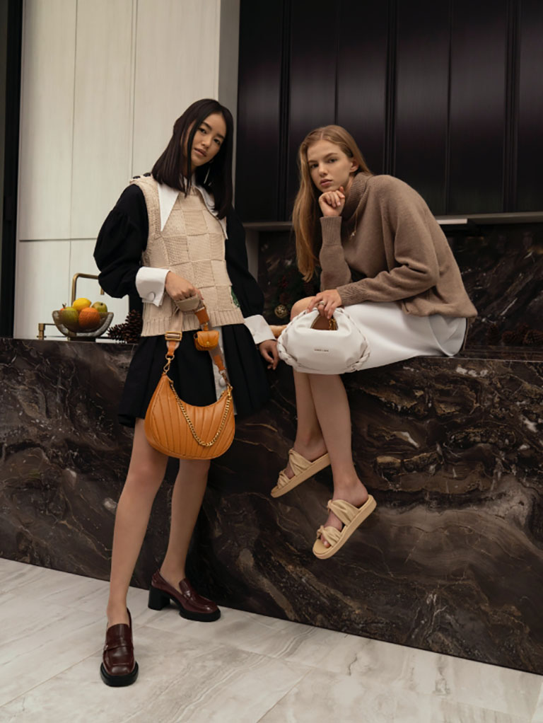 women’s chain handle pleated moon bag, chain handle braided hobo bag, penny loafer pumps and twist strap padded slide sandals – CHARLES & KEITH