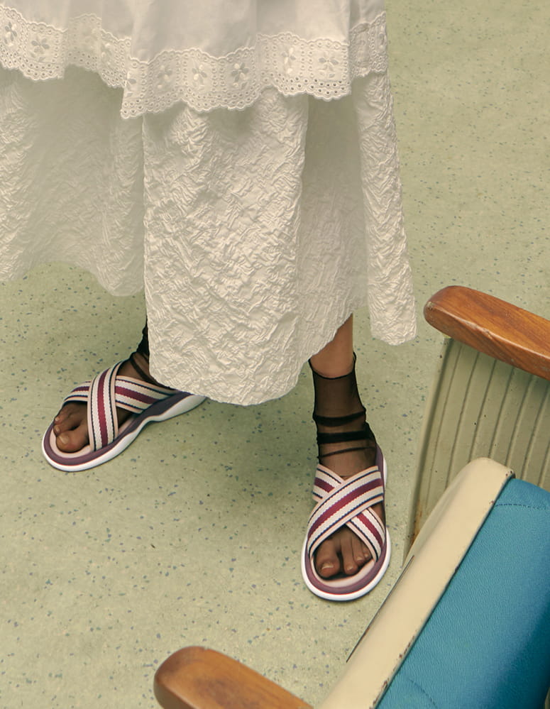 Grosgrain slide sandals in nude paired with mesh socks.
