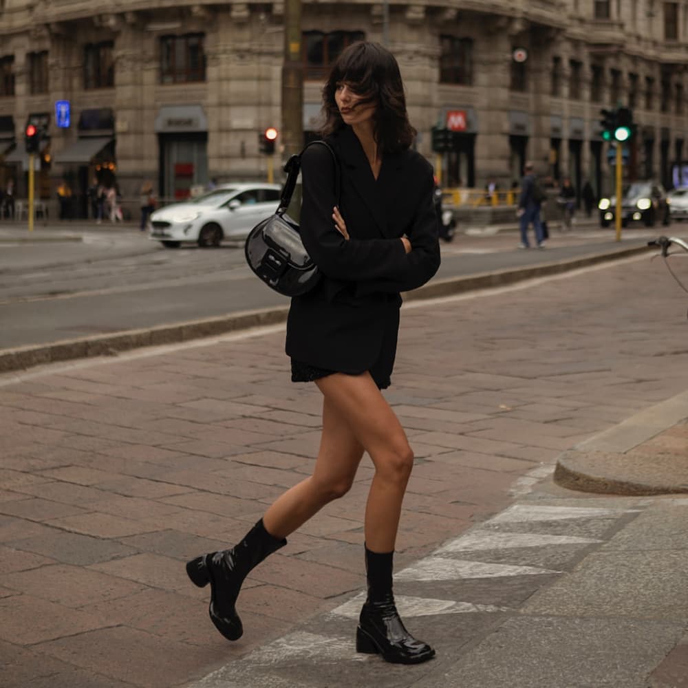 Women's black Lula patent chunky heel calf boots and black Lula patent buckled bag, as seen on @justinesoranzo - CHARLES & KEITH