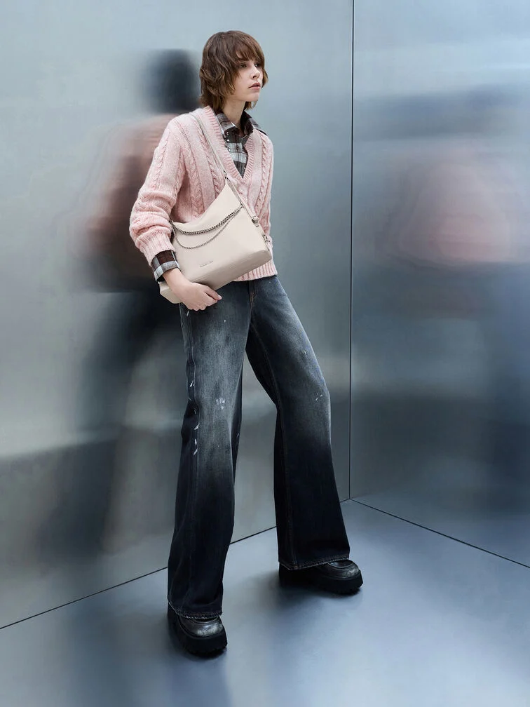 Chunky platform shoes not only keep the hems of wide leg pants off the ground, but also matches their bold, dramatic quality.