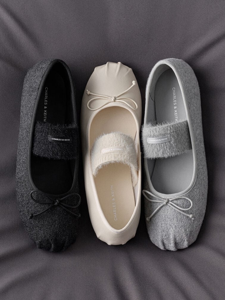 Mary Jane flats with ballerina-inspired bow accents, ideal for comfortable all-day wear.