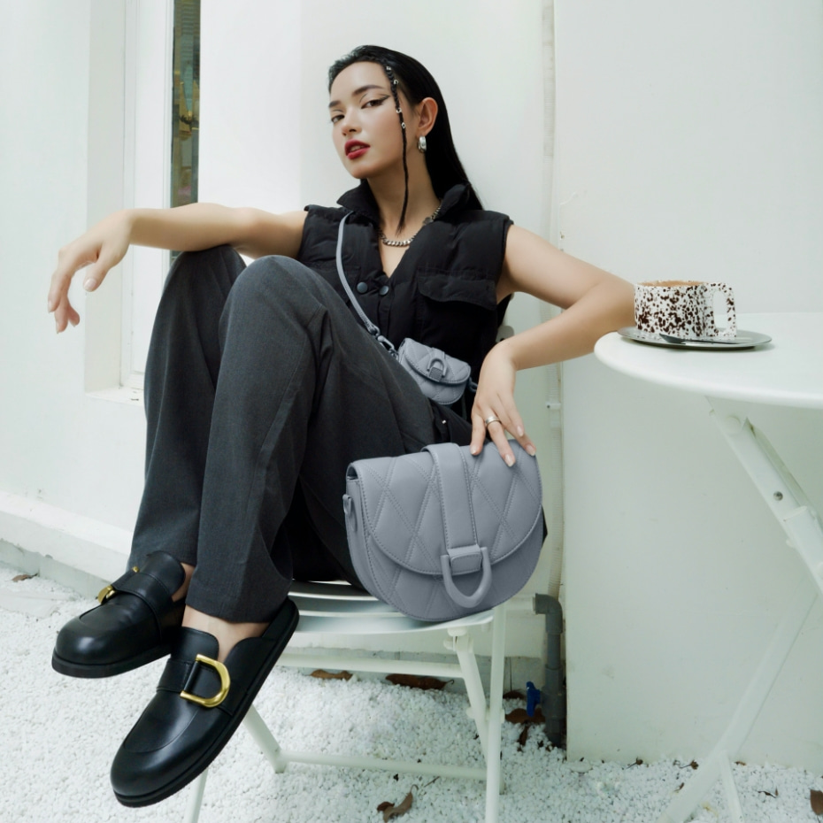 Gabine and micro Gabine quilted saddle bag in steel blue, and Gabine buckled leather loafer mules in black - CHARLES & KEITH