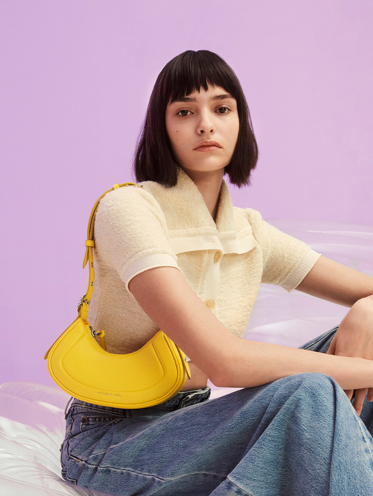 Women’s Petra curved shoulder bag in yellow - CHARLES & KEITH
