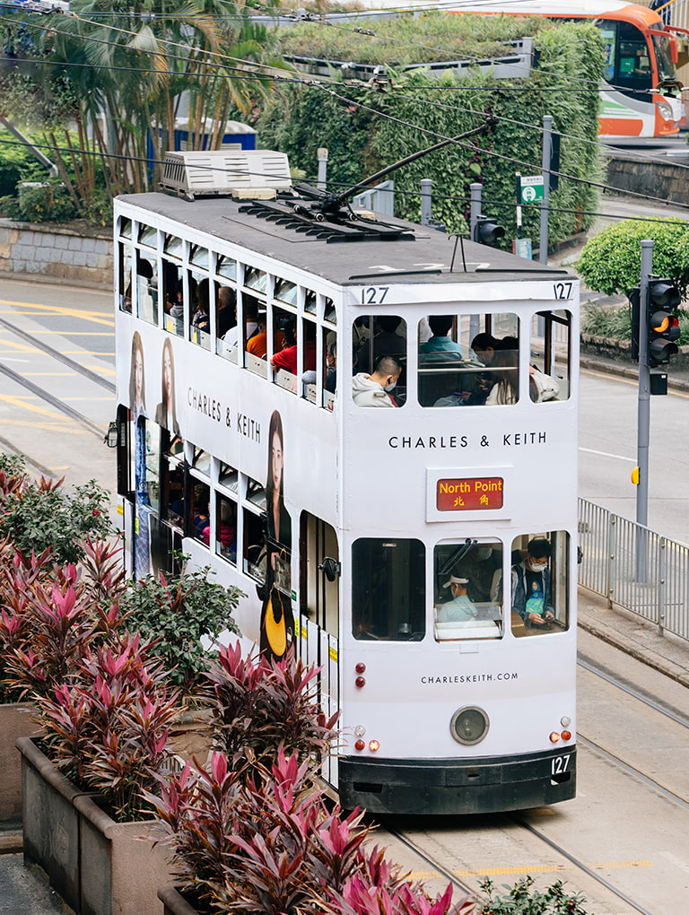 Tram with images of CHARLES & KEITH’s Spring Summer 2023 campaign with ITZY moving around Hong Kong