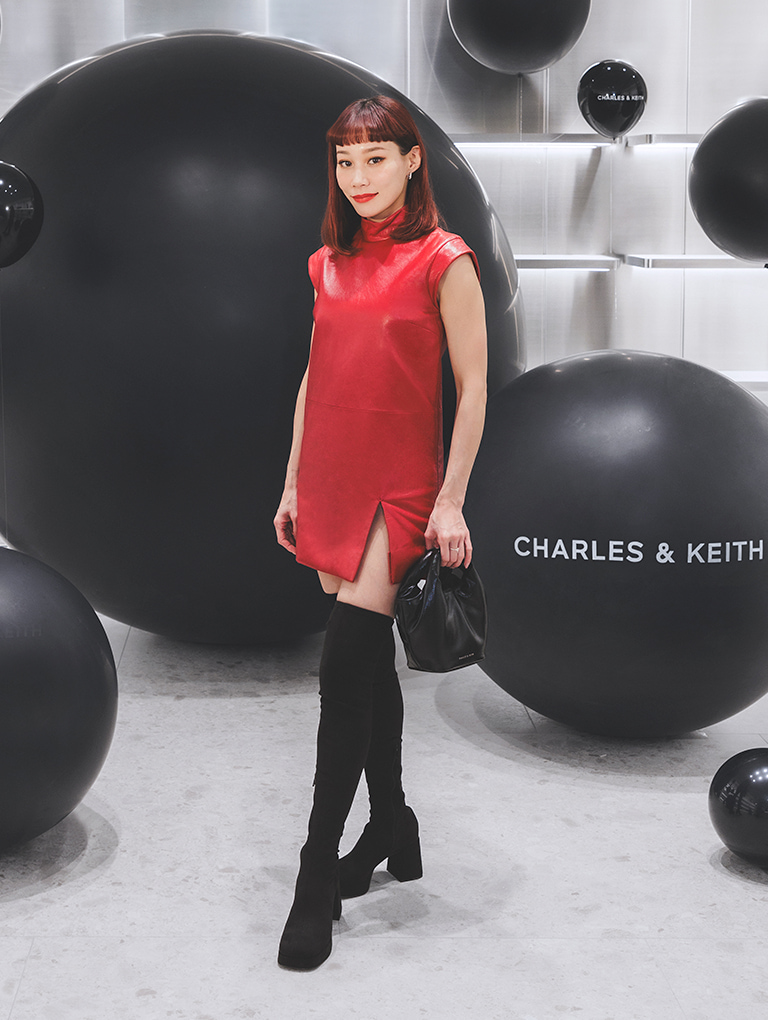 Women’s Yama padded chain-handle bag and Evie textured platform thigh-high boots, as seen on Mademoiselle Yulia - CHARLES & KEITH