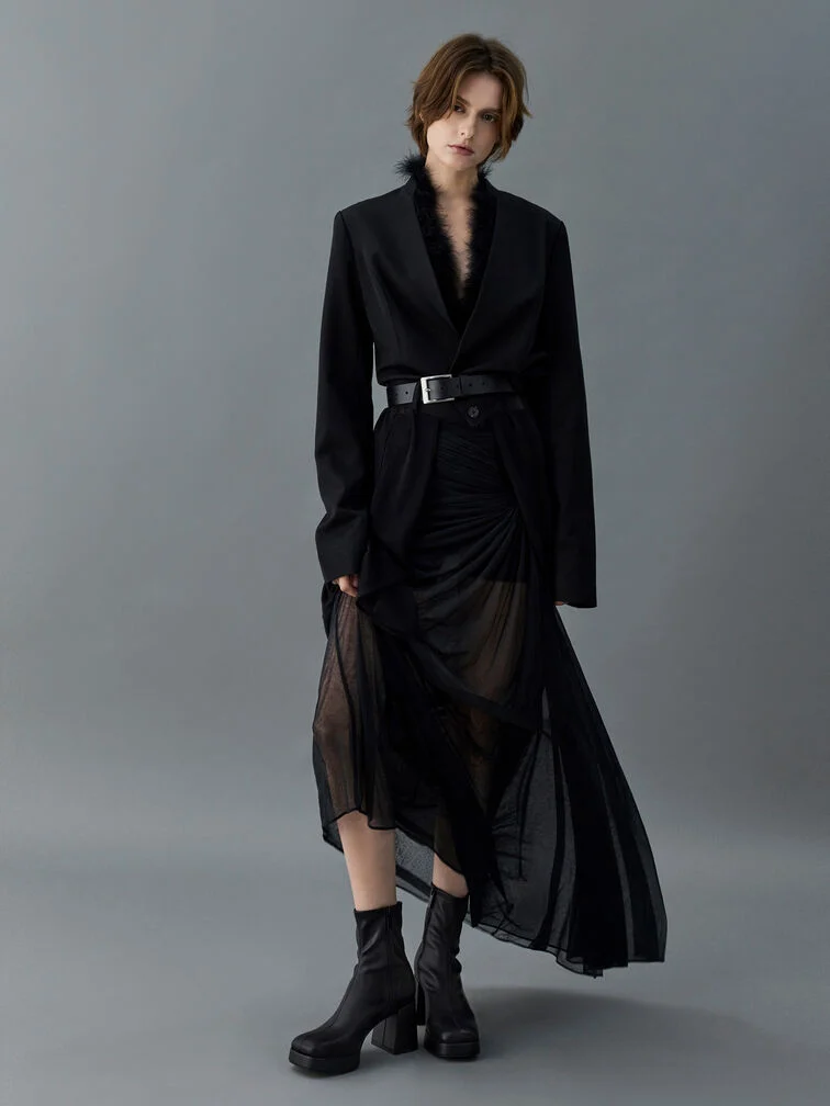 Balance the proportions of a long, oversized blazer with a midi or maxi skirt. 