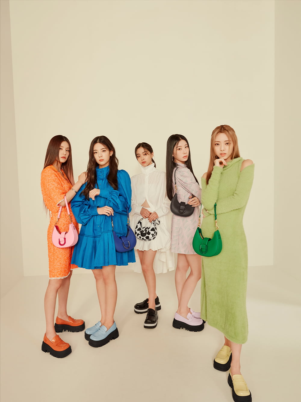 ITZY X CHARLES & KEITH: ITZ MINE cobalt, dark moss, chalk, pink, and green Gabine belted hobo bag and lilac, yellow, orange, light blue and black Rainier chunky platform penny loafers