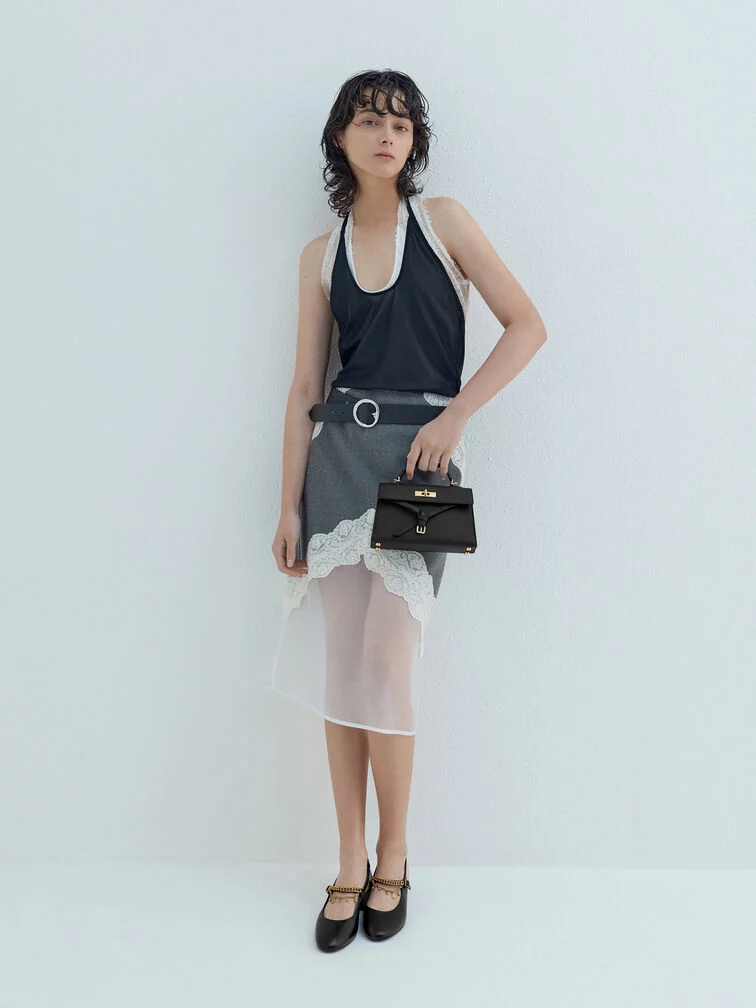 Balance the proportions of a long, oversized blazer with a midi or maxi skirt. 