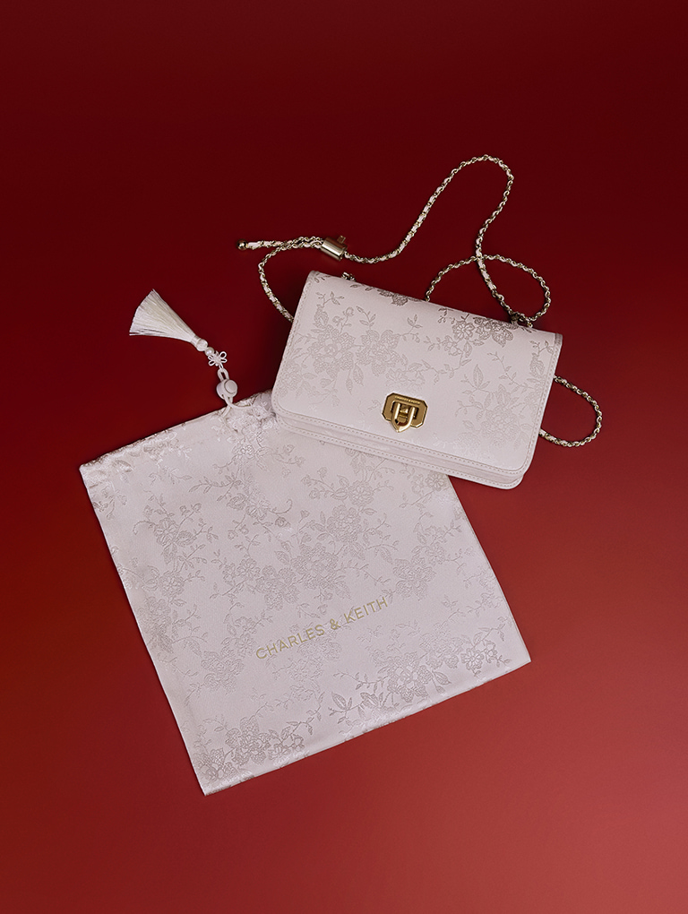 CHARLES & KEITH’s exclusive Lunar New Year pink dust bag  - CHARLES & KEITH