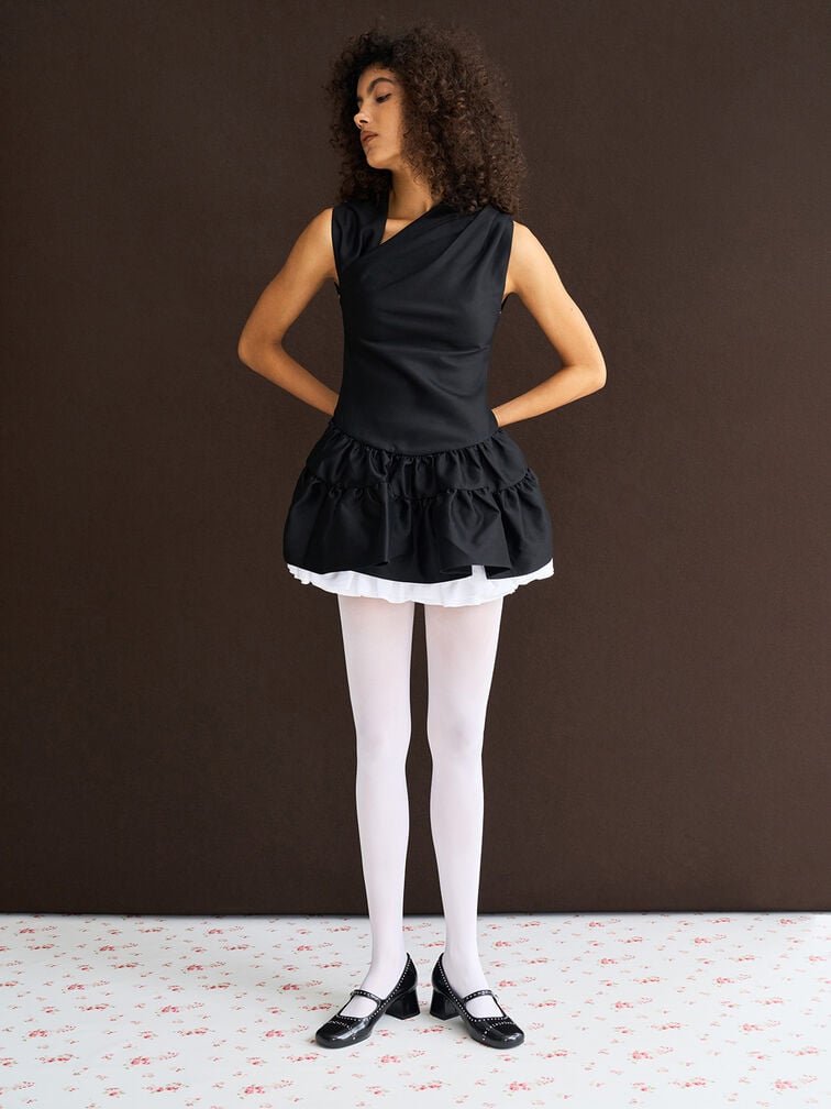 Classic Mary Jane pumps pair well with bubble mini dress