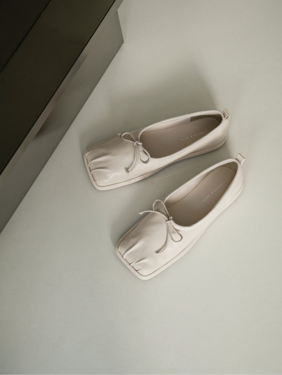  - CHARLES & KEITH