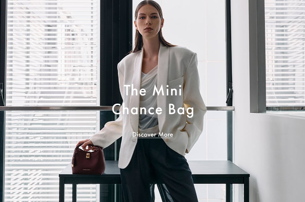 Wineberry red mini Chance Turn-Lock Bucket Bag - CHARLES & KEITH