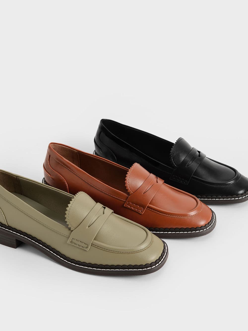 Women's scallop-trim penny loafers in olive, cognac, black - CHARLES & KEITH
