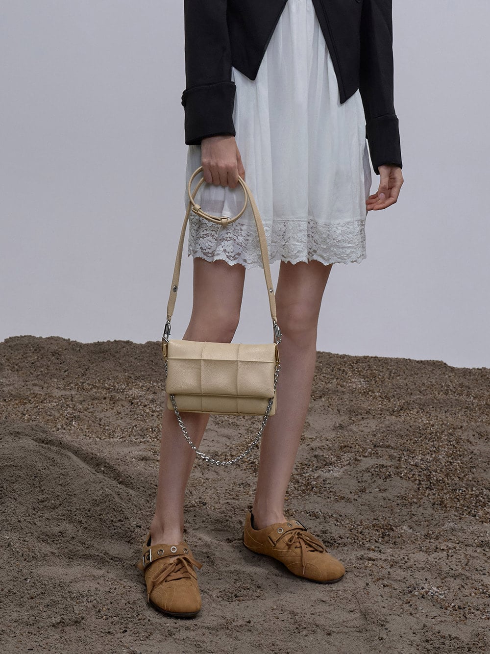 Delfina quilted wallet on chain in sand beige - CHARLES & KEITH