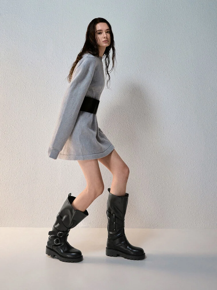 A cosy mini dress paired with knee-high boots. 
