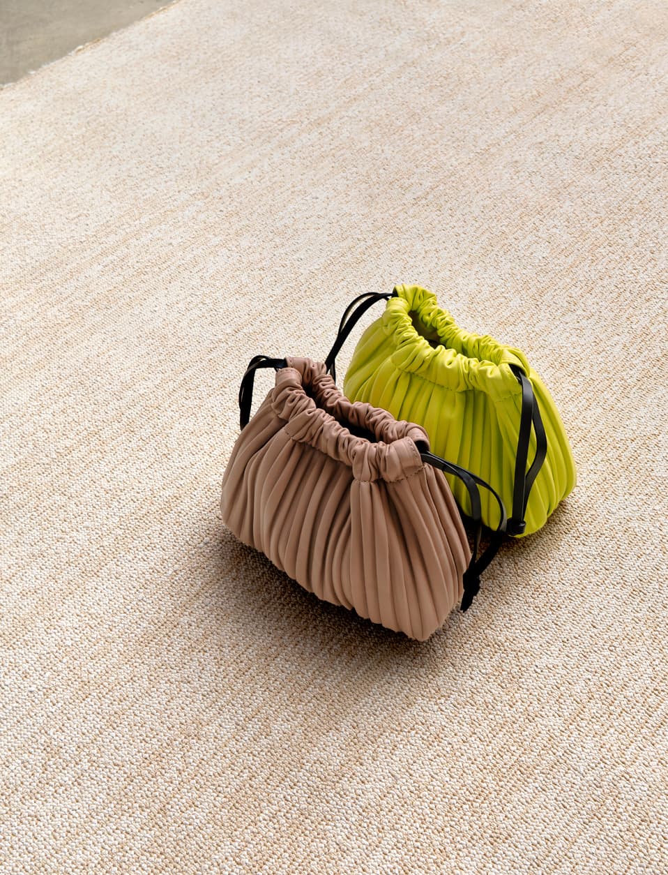 Women’s pleated drawstring bag in light pink and neon yellow – CHARLES & KEITH