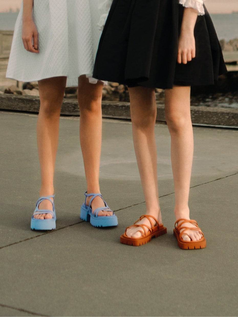 Women’s Strappy Cleated Sole Sandals in orange and Nadine Strappy Platform Sandals in blue - CHARLES & KEITH