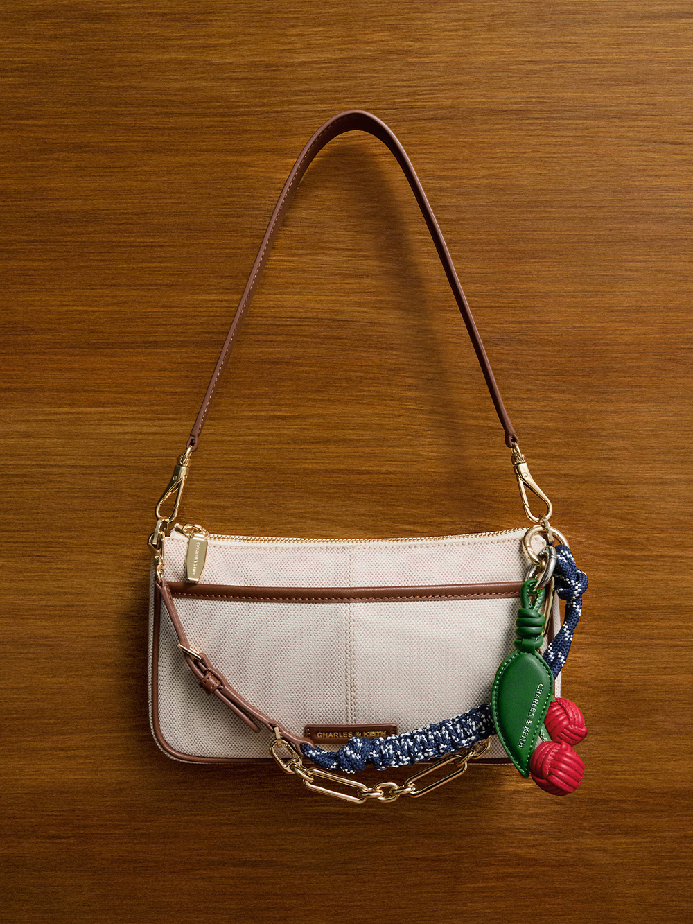 Ally Ruched Slouchy Knotted Bag & Fruit Charms Set from the CHARLES & KEITH x YVMIN collection