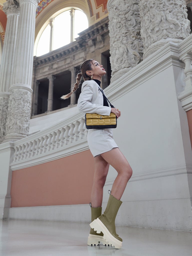 Women’s Maze chunky chain handle quilted shoulder bag and Rhys Chelsea calf boots, as seen on Lily May Mac - CHARLES & KEITH