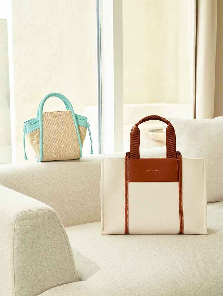 Women’s mint green Ashby Raffia Tote Bag & black Espadrille Thong Sandals, as seen on model Joo-Hee - CHARLES & KEITH