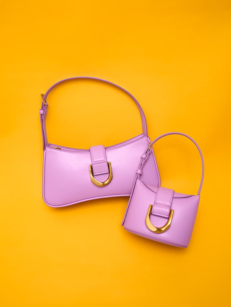 Gabine Curved Shoulder Bag and Gabine Bucket Bag, both in violet - CHARLES & KEITH