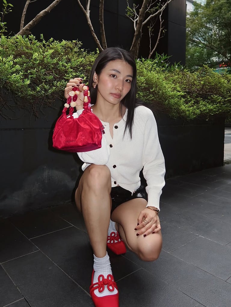 Women’s Aviary jacquard beaded-handle bag and clover-knot Mary Jane flats, as seen on Evelyn Tay 