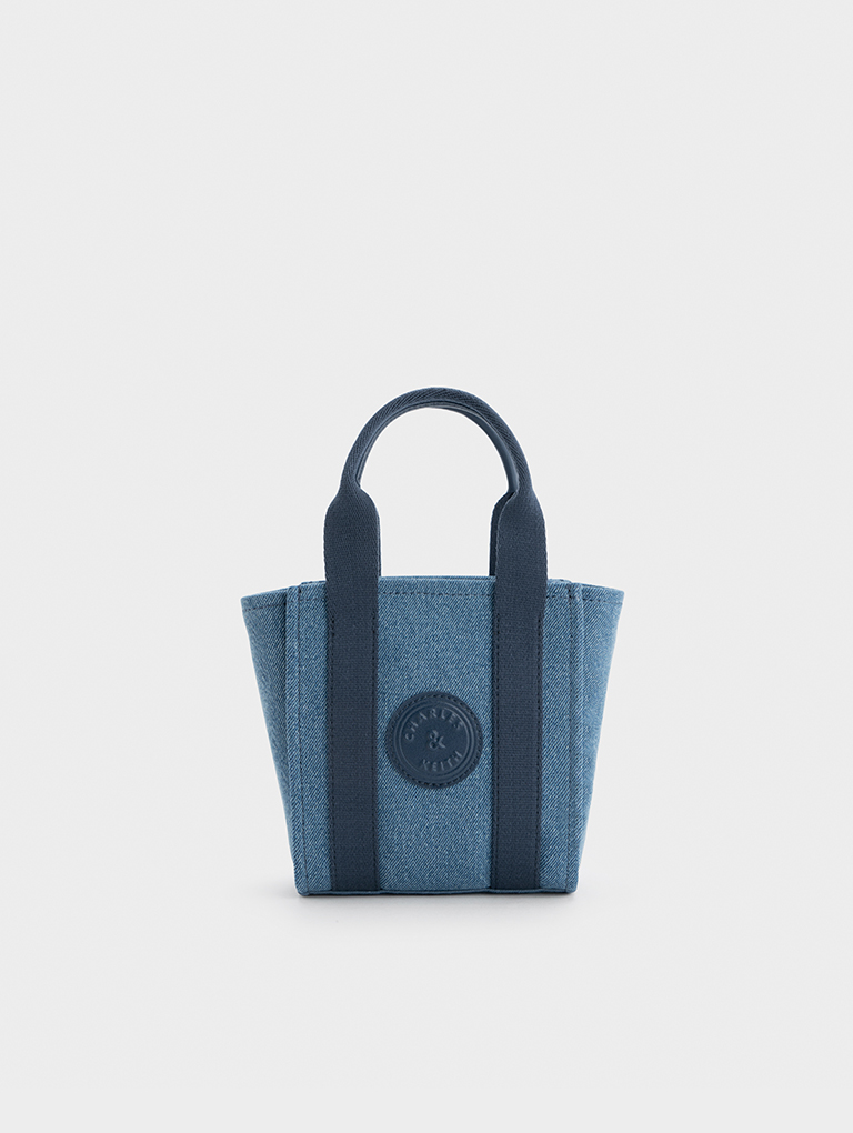 Women’s mini Kay denim contrast-trim tote bag in blue - CHARLES & KEITH