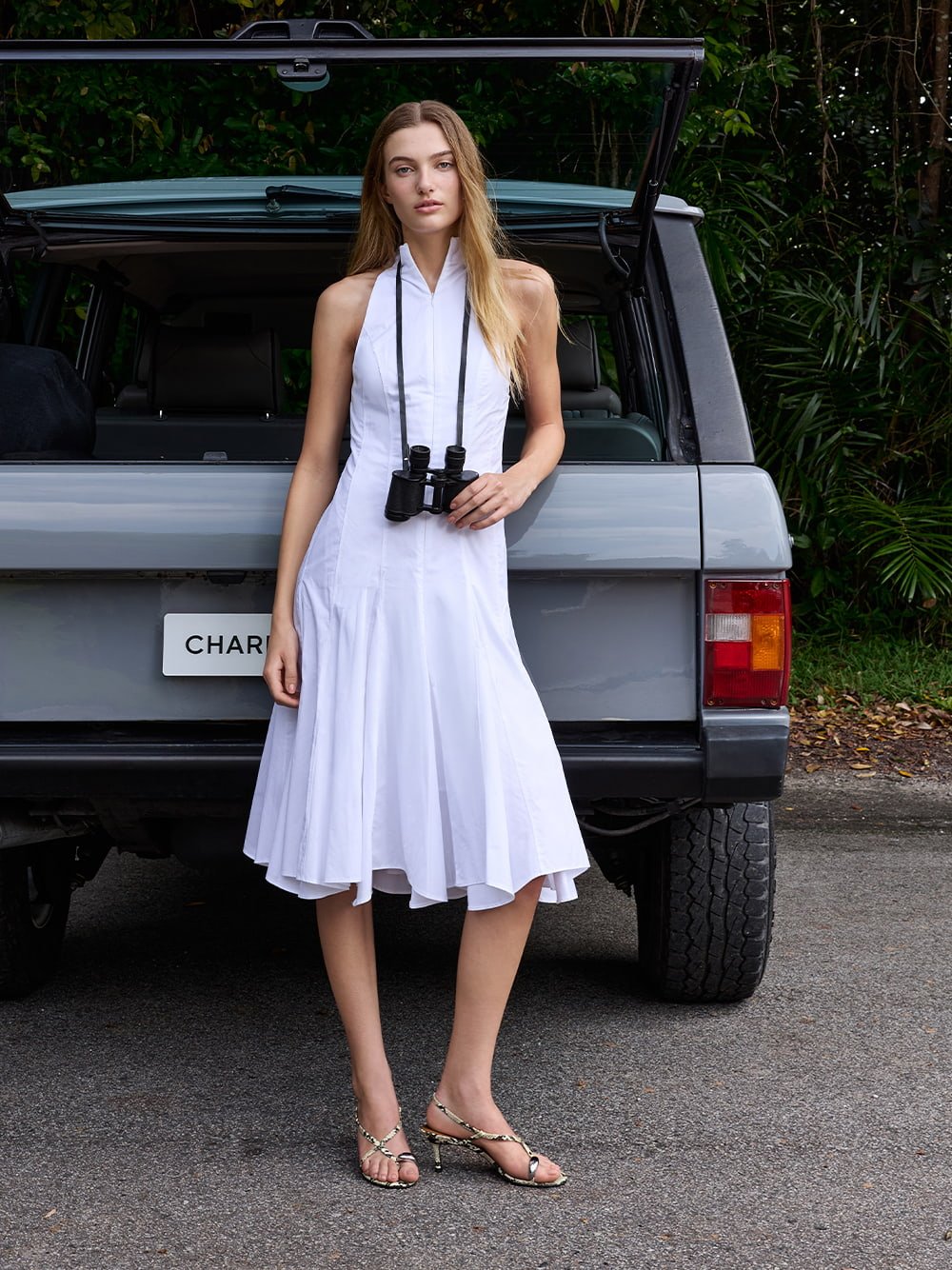 Women’s Raina snake-print toe-ring heeled sandals (on model) - CHARLES & KEITH