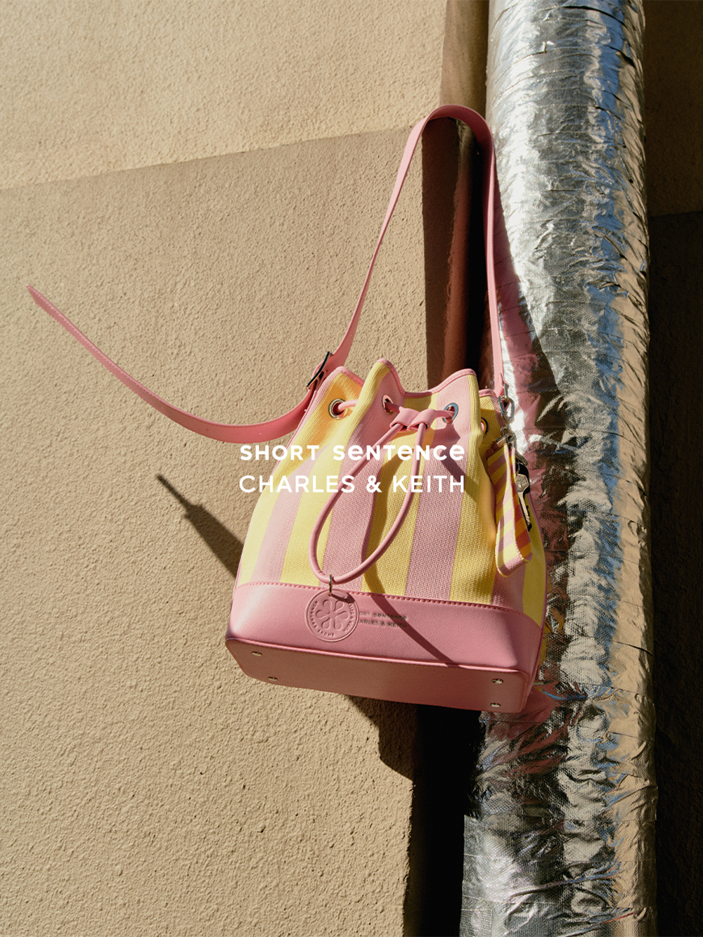 Women’s Noir Grommet Crescent Hobo Bag - CHARLES & KEITH