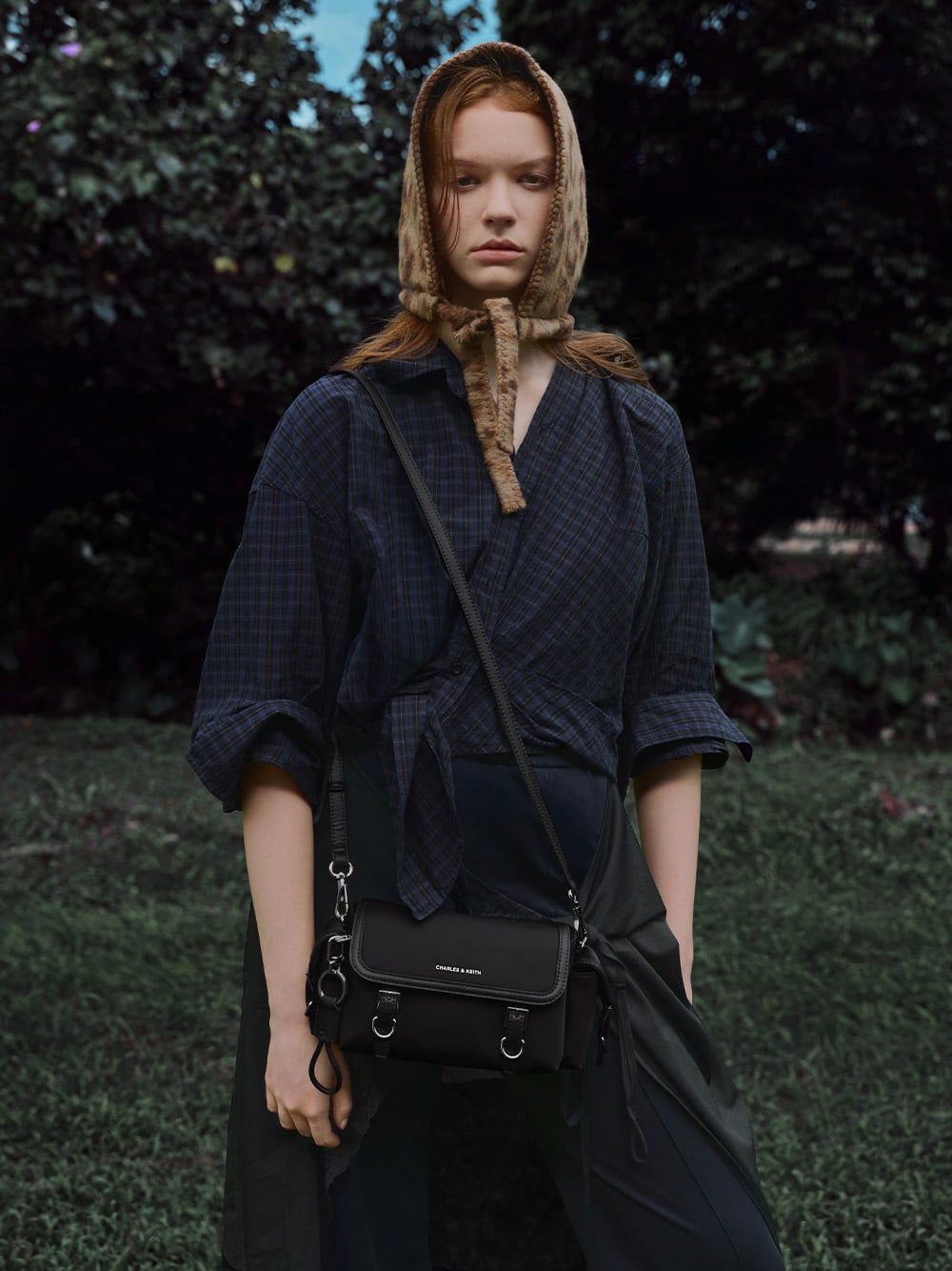 Women's Levy Nylon Buckled Crossbody Bag in noir - CHARLES & KEITH