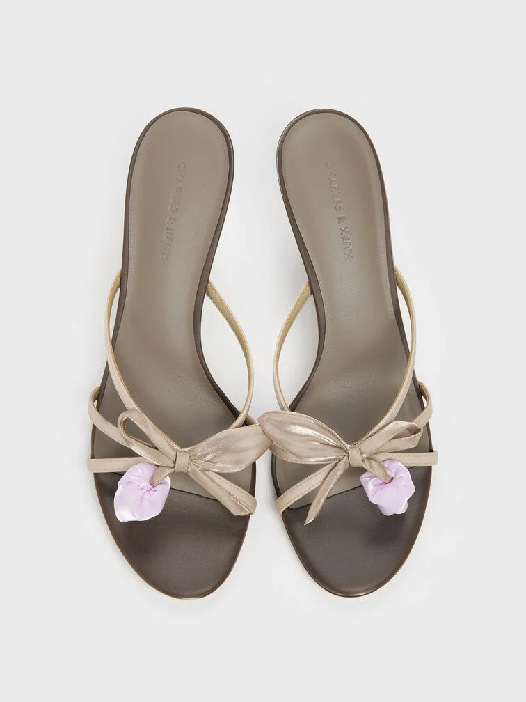 Dark brown heeled sandals with bow and pearl details, perfect for daytime celebrations.