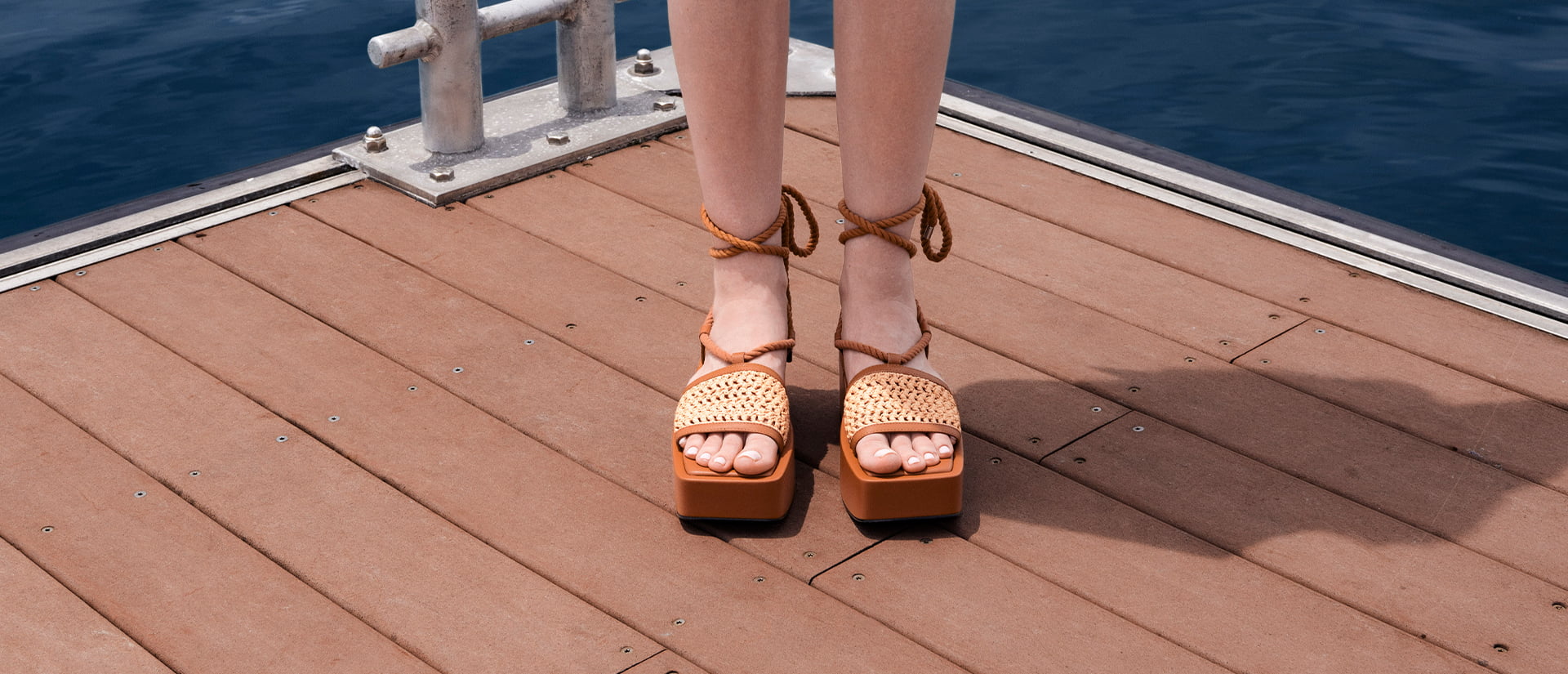 Women’s Micah raffia & leather tie-around sandals in brown (close up) - CHARLES & KEITH