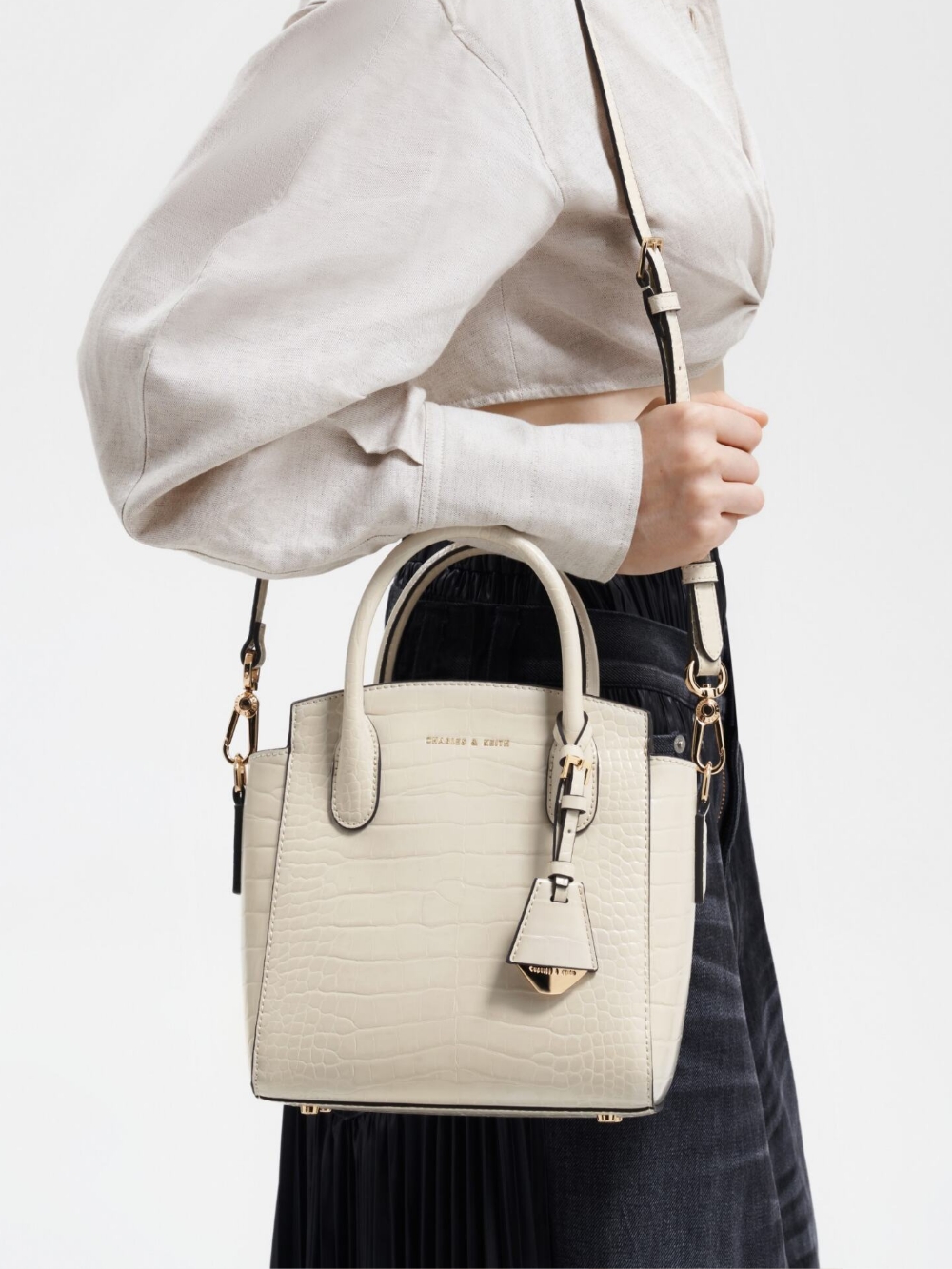 Women’s beige Alcott bucket bag, beige Alcott push-lock chain bag and beige Alcott tote bag - CHARLES & KEITH