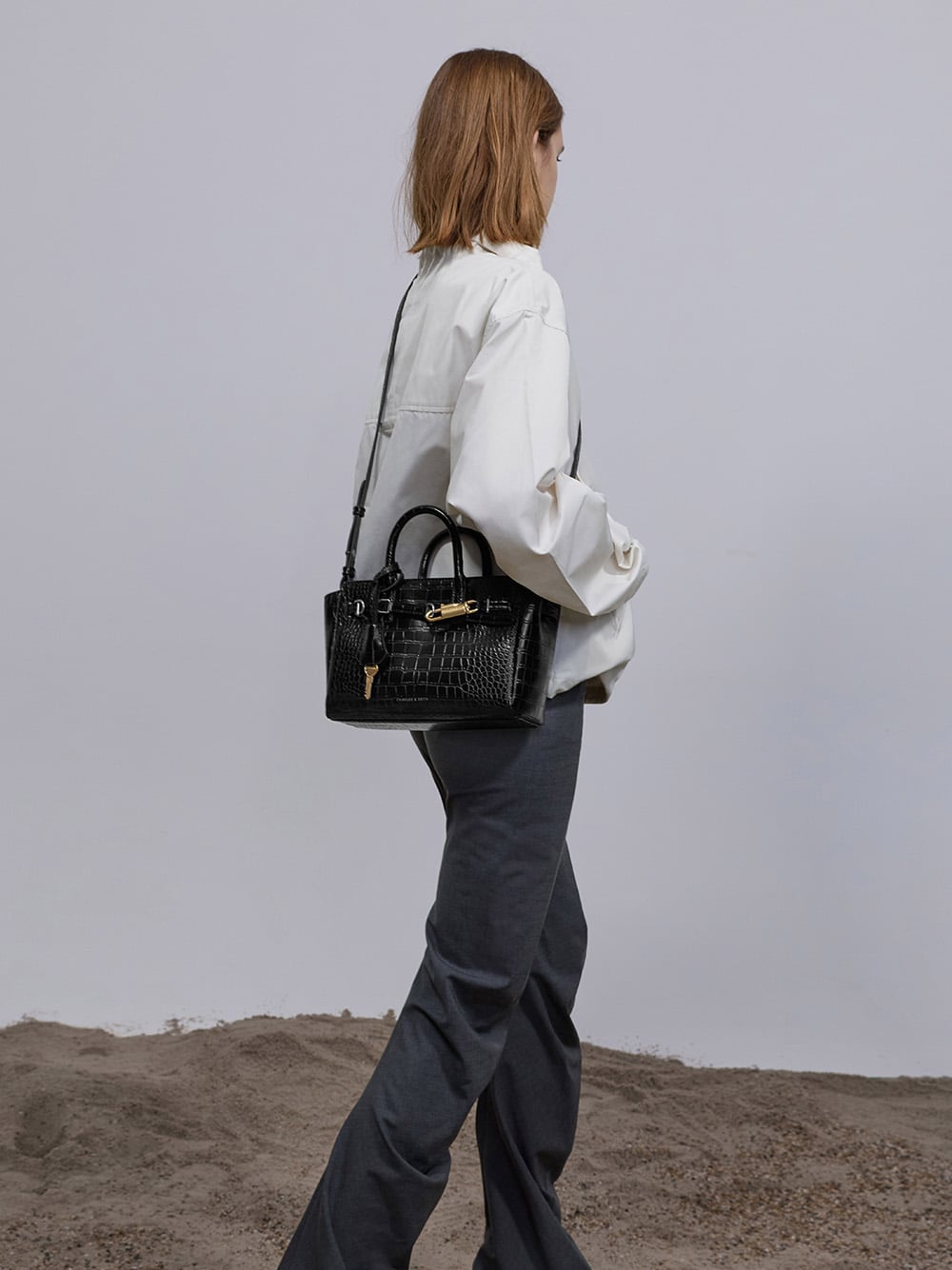 Mini Delfina belted tote bag in black croco - CHARLES & KEITH