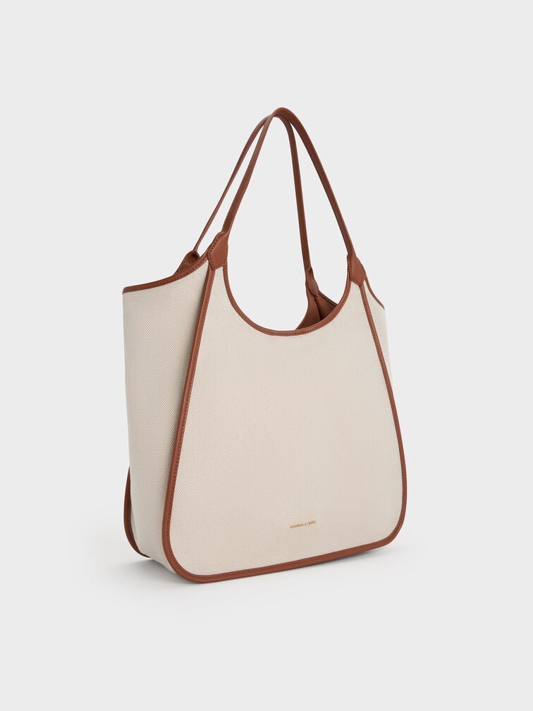 Roomy and lightweight canvas tote bag, the perfect style companion for pickleball playdates.