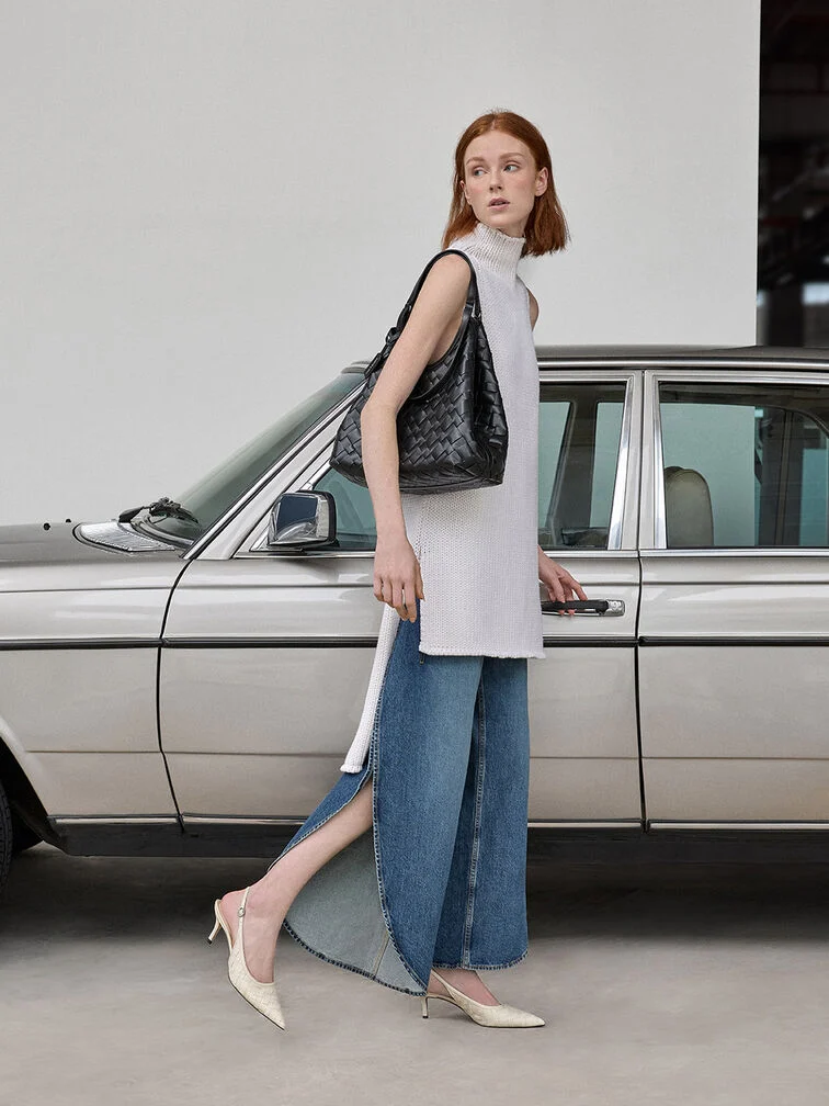 Sleek woven heels styled with flowy denim jeans and a woven bag for a co-ordinated workwear look.