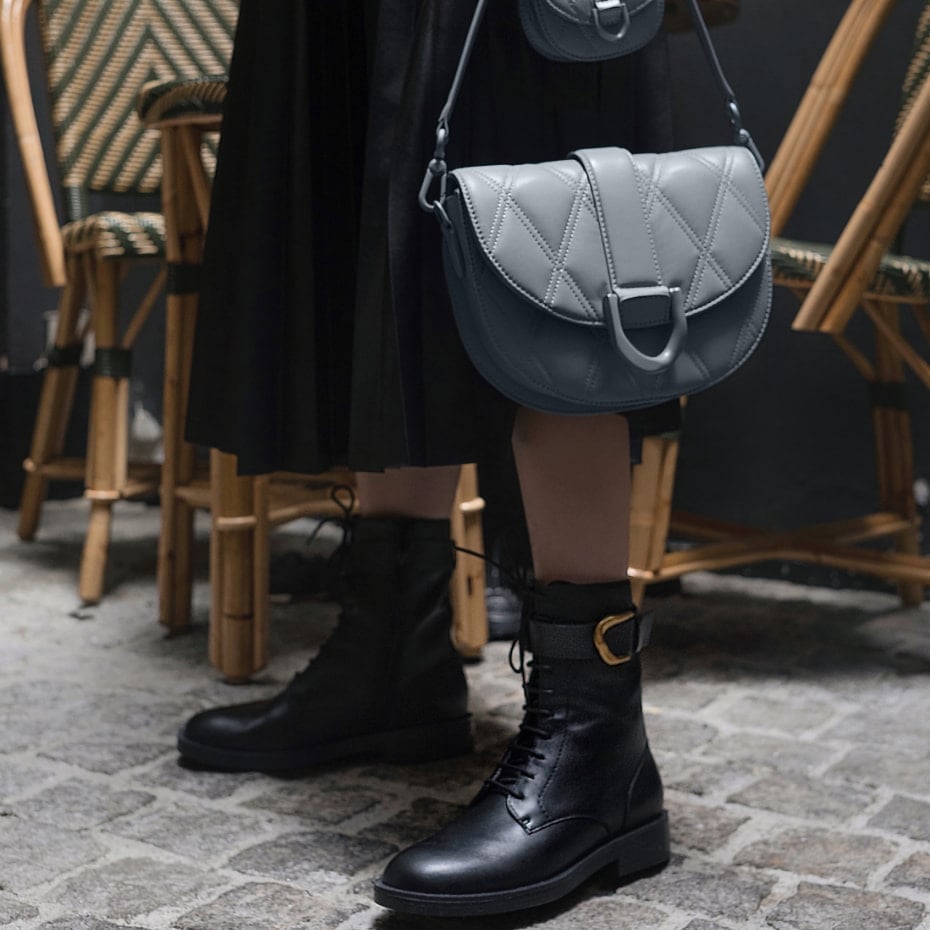 Gabine and micro Gabine quilted saddle bag in steel blue, and Gabine buckled leather ankle boots in black - CHARLES & KEITH