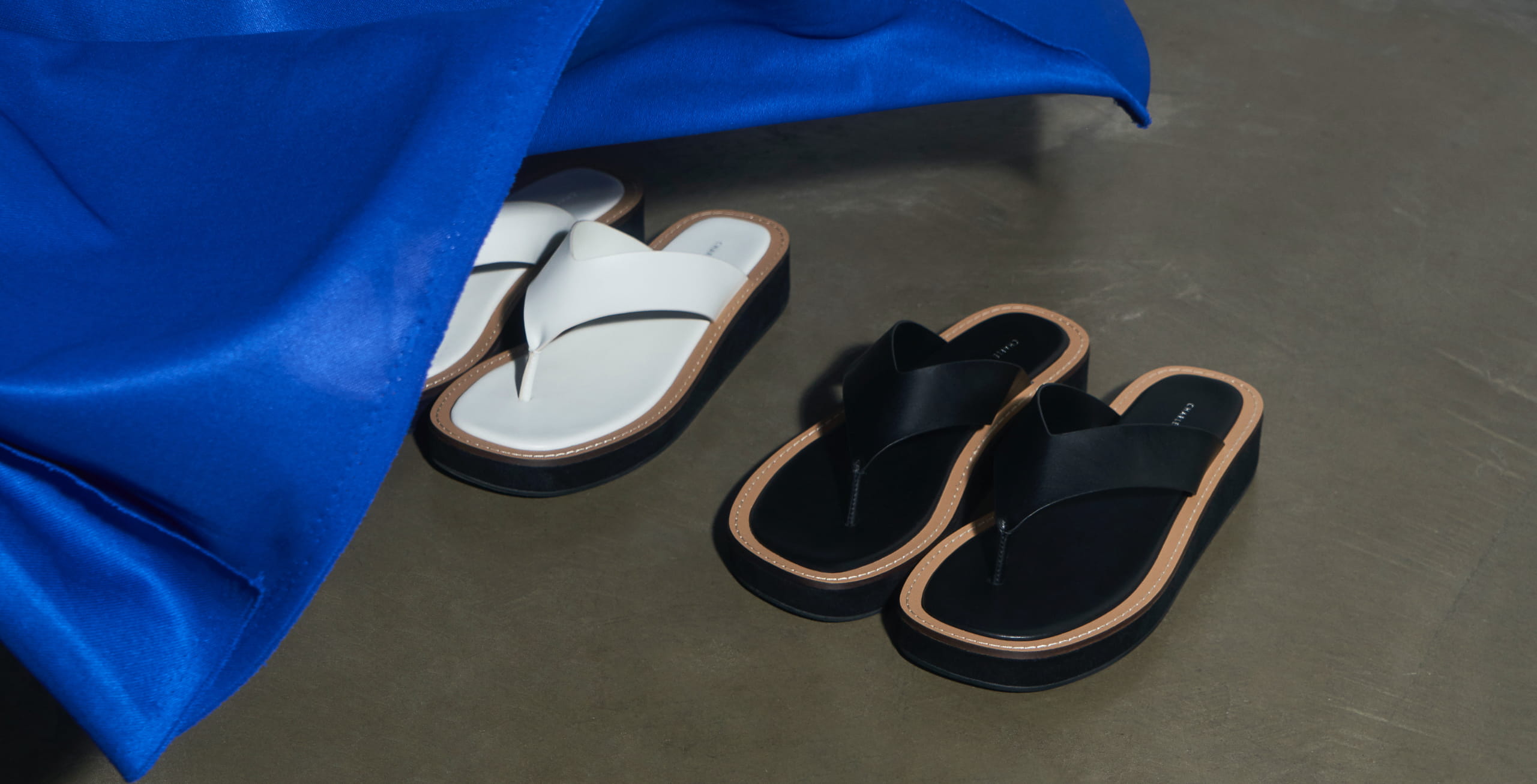 Women’s platform thong sandals in black and chalk - CHARLES & KEITH