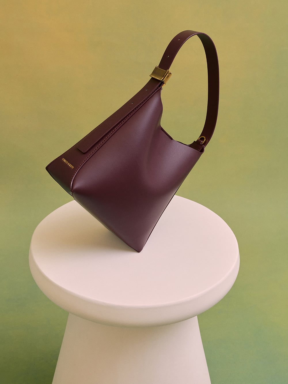 Edna Bucket Bag in wineberry red - CHARLES & KEITH