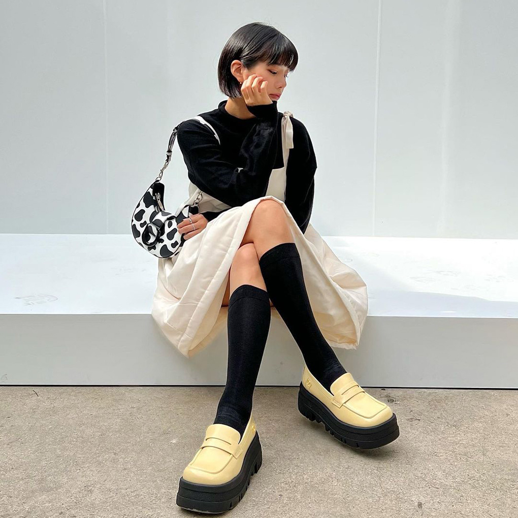 ITZY Rainier Chunky Platform Penny Loafers in yellow and ITZY Gabine Belted Hobo Bag in chalk - CHARLES & KEITH