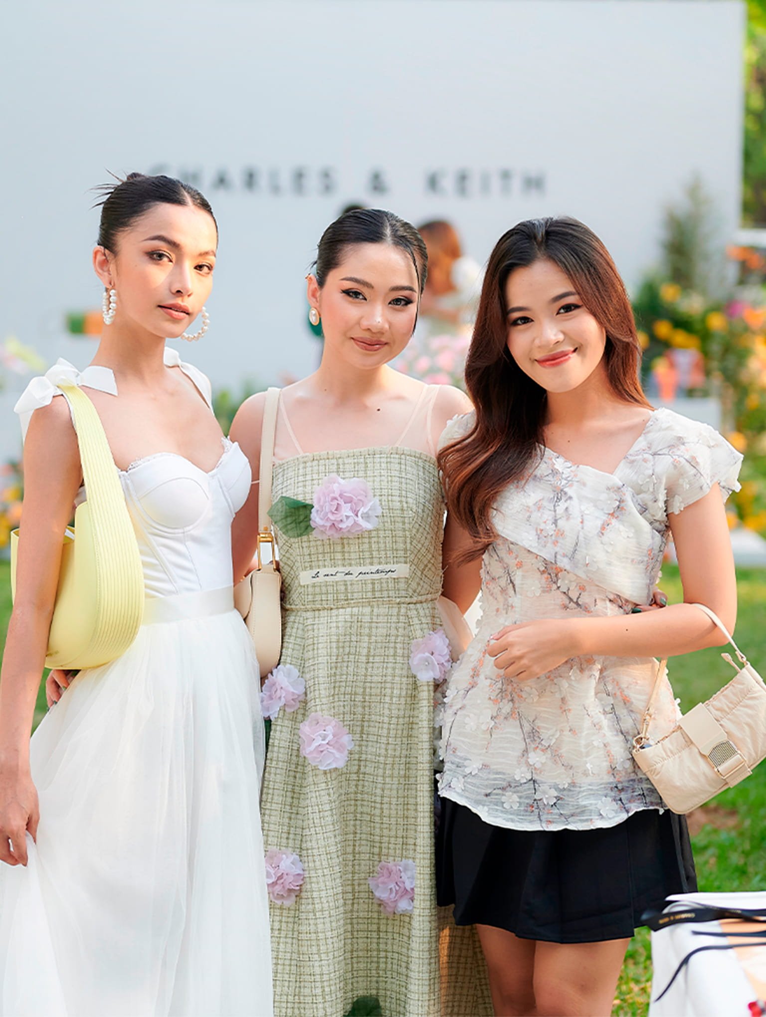 Daa Dao, Xiang and Sarajune attend the CHARLES & KEITH ‘Blooming Spring’ event in Phnom Penh, Cambodia