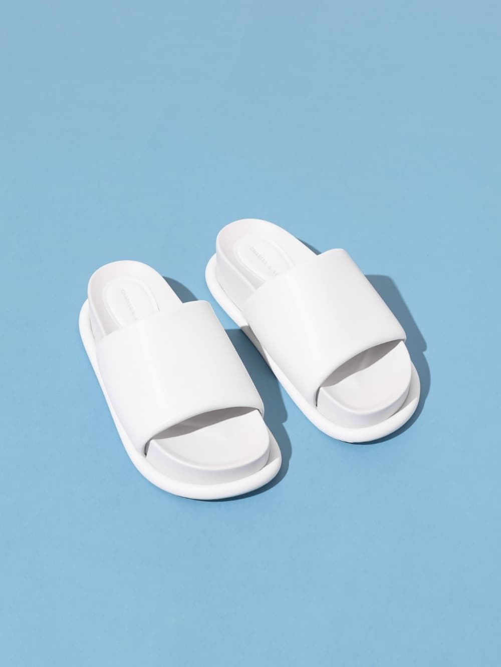 Women’s white panelled slip-on sneakers - CHARLES & KEITH